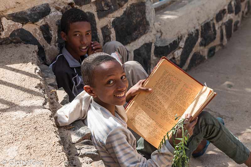 eritrean boy studying the bible