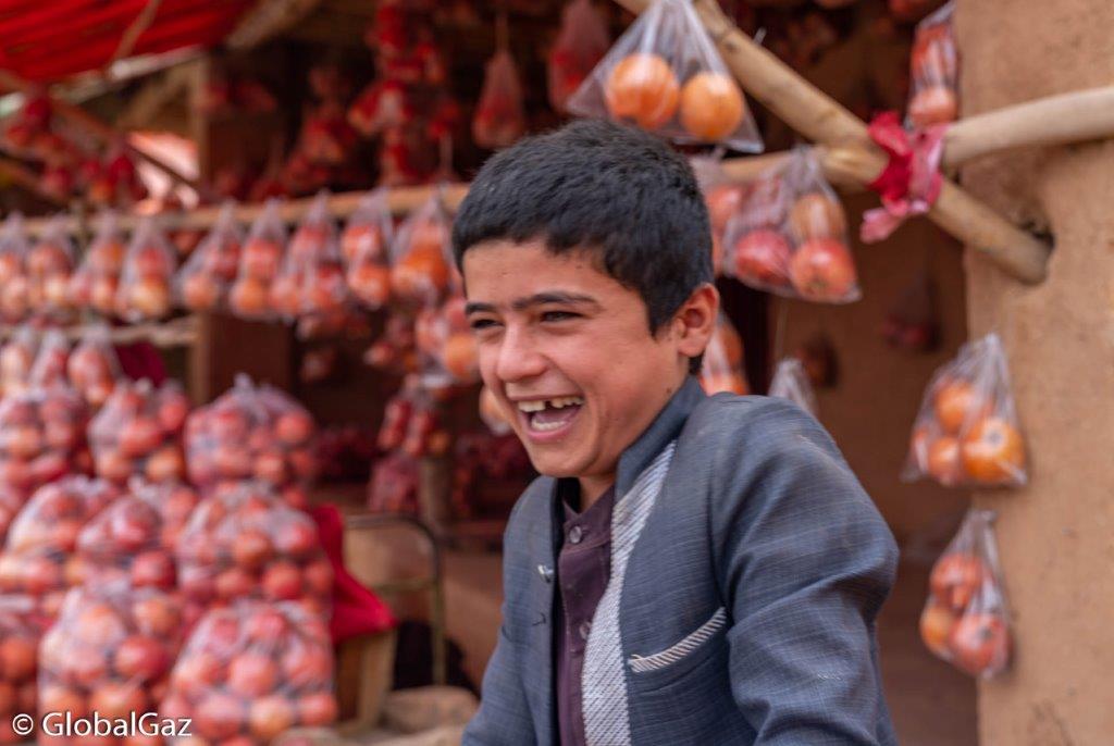 afghan boy smiling