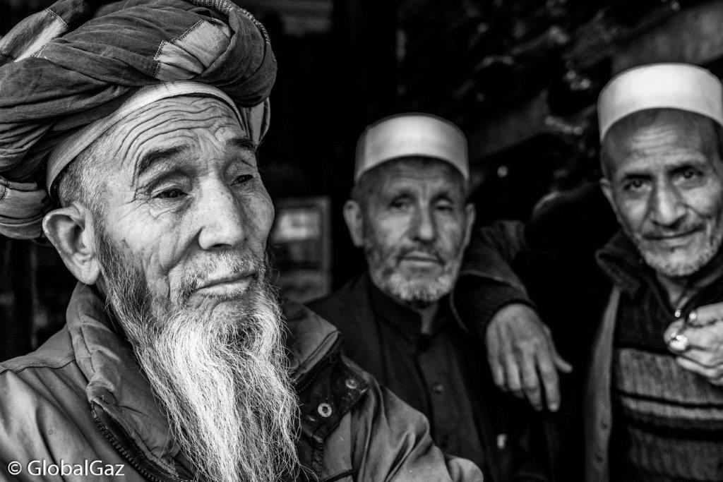 afghan men in bird market